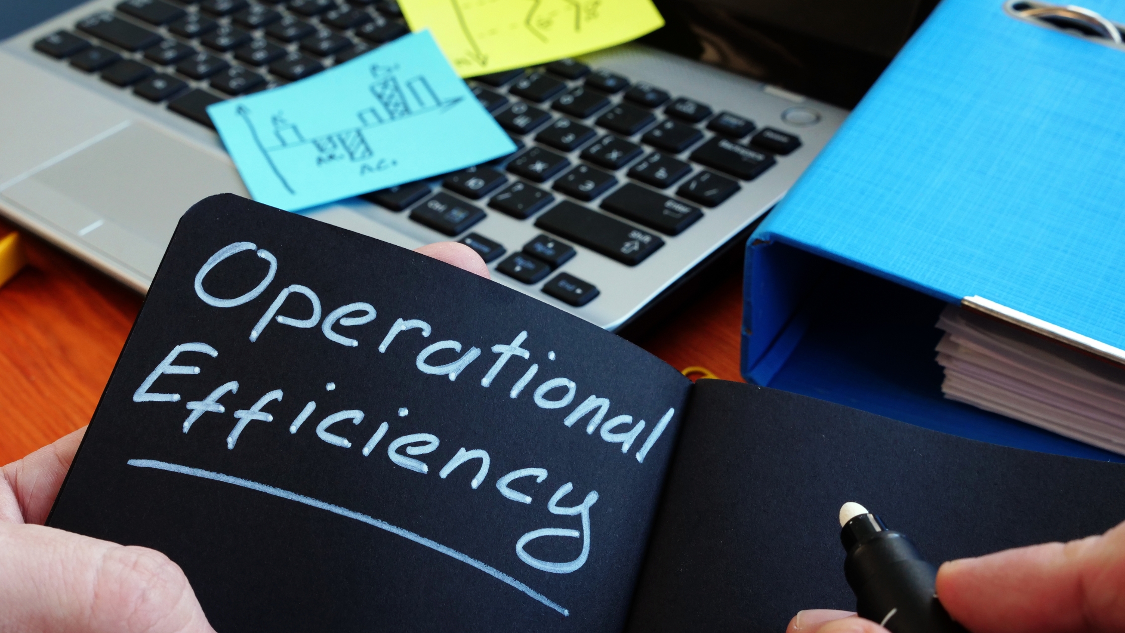 Streamline your operations: Close-up of notebook page titled "Operational Efficiency"