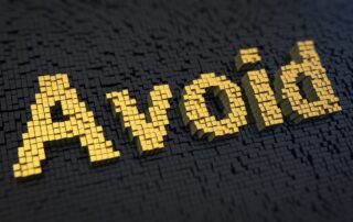 Avoid Costly Debt: Gold 3D image of the word "Avoid," representing the need to steer clear of common debt traps.