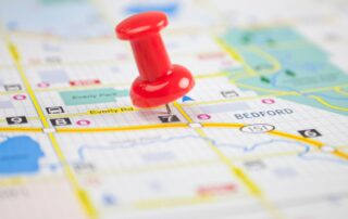 Navigating Debt Recovery Challenges: Red map pin marking a location on a map, illustrating the focused nature of debt recovery efforts.