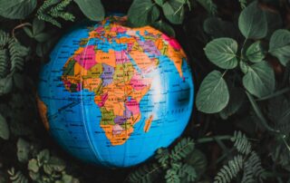 International Debt Collection: A globe with a focus on Africa, representing the intricacies of international debt collection in various countries.
