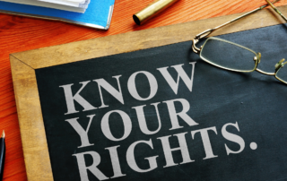 Effective Debt Collection: A chalkboard with the phrase "Know Your Rights" written in white chalk, emphasizing the importance of understanding legal rights and obligations during debt collection.