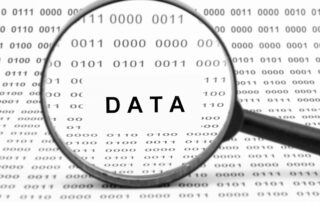 Personalized Collections: A magnifying glass focuses on the word "DATA" amidst a sea of binary code (0s and 1s).