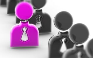 Personalized Collections: A single purple figure stands out in a line of gray figures, symbolizing a unique individual or customer.