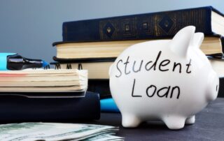 Student Loan Forgiveness: A piggy bank with "Student Loan" written on it, surrounded by books and money, illustrates the impact of student loan forgiveness on debt collection practices.